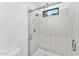 Clean and modern shower with glass enclosure and marble-look tile at 4220 N 32Nd St # 4, Phoenix, AZ 85018