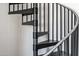 Modern black metal spiral staircase with silver accents at 4220 N 32Nd St # 4, Phoenix, AZ 85018