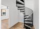 Modern spiral staircase leading to upper levels of the home at 4220 N 32Nd St # 4, Phoenix, AZ 85018