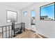 Bright hallway with access to a rooftop patio and spiral staircase at 4220 N 32Nd St # 4, Phoenix, AZ 85018