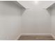 Empty closet with wood-look floors and shelving at 17226 N 29Th Dr, Phoenix, AZ 85053