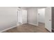 Well-lit bedroom with wood-look floors and closets at 17226 N 29Th Dr, Phoenix, AZ 85053