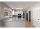 Modern kitchen with stainless steel appliances and white cabinets at 17226 N 29Th Dr, Phoenix, AZ 85053