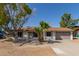 Ranch-style home with attached garage and mature landscaping at 17226 N 29Th Dr, Phoenix, AZ 85053