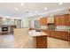 Kitchen with island, wood cabinets, and tile floors at 15120 E Vermillion Dr, Fountain Hills, AZ 85268