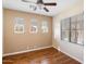 Bedroom with hardwood floors and multiple windows at 15120 E Vermillion Dr, Fountain Hills, AZ 85268