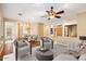 Living room with hardwood floors, staged furniture, and inviting atmosphere at 15120 E Vermillion Dr, Fountain Hills, AZ 85268