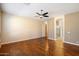 Spacious bedroom with hardwood floors and access to bathroom at 15120 E Vermillion Dr, Fountain Hills, AZ 85268