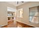 Bright dining area with hardwood floors and views to the backyard at 15120 E Vermillion Dr, Fountain Hills, AZ 85268