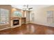 Living room with fireplace and hardwood floors at 15120 E Vermillion Dr, Fountain Hills, AZ 85268