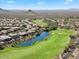 Aerial view of golf course community near a lake at 15120 E Vermillion Dr, Fountain Hills, AZ 85268