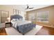 Main bedroom with plush bed and hardwood floors at 15120 E Vermillion Dr, Fountain Hills, AZ 85268