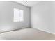 Simple bedroom with carpeted floor and a window at 22788 E Orion Way, Queen Creek, AZ 85142