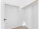 Large walk-in closet with double rods and neutral walls at 22788 E Orion Way, Queen Creek, AZ 85142