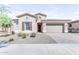 One-story home with attractive landscaping and two-car garage at 22788 E Orion Way, Queen Creek, AZ 85142