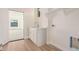 Convenient laundry room with cabinets and sink at 16970 W Baker St, Surprise, AZ 85387