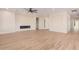 Bright and spacious living room with hardwood floors and fireplace at 16970 W Baker St, Surprise, AZ 85387