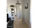 Clean hallway with tile floors and decor at 6415 S Newberry Rd # C, Tempe, AZ 85283