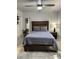 Spacious bedroom with a king-size bed and modern nightstands at 6415 S Newberry Rd # C, Tempe, AZ 85283