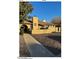 Front view of single-story home with walkway and landscaping at 6415 S Newberry Rd # C, Tempe, AZ 85283