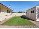 Putting green and storage shed in backyard at 127 E Garfield St, Tempe, AZ 85288