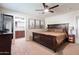 Large main bedroom with a king-size bed and ceiling fan at 127 E Garfield St, Tempe, AZ 85288
