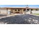 Large backyard with covered patio, grill, and gravel landscaping at 127 E Garfield St, Tempe, AZ 85288