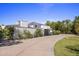 Stunning curb appeal with a long driveway and lush landscaping at 6644 E Exeter Blvd, Scottsdale, AZ 85251