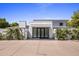 Modern home with a clean facade and double front doors at 6644 E Exeter Blvd, Scottsdale, AZ 85251
