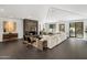 Living room with a large sectional sofa and a modern fireplace at 6644 E Exeter Blvd, Scottsdale, AZ 85251