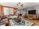 Spacious living room with leather furniture and southwestern decor at 19104 N Smith Dr, Maricopa, AZ 85139