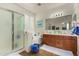 Bathroom boasts double vanity, soaking tub, and walk-in shower at 19104 N Smith Dr, Maricopa, AZ 85139