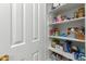 Well-organized pantry with ample shelving for storage at 6439 W Fawn Dr, Laveen, AZ 85339