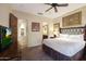 Spacious bedroom with a king-size bed and ensuite bathroom access at 27440 N Alma School Pkwy # 33-2, Scottsdale, AZ 85262