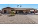 Brick ranch house with solar panels and a fountain at 4701 W Aire Libre Ave, Glendale, AZ 85306