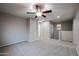 Bright bedroom with ceiling fan and carpet flooring at 7017 S 7Th Ln, Phoenix, AZ 85041