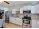 Updated kitchen with stainless steel appliances and granite counters at 7830 N 17Th Ave, Phoenix, AZ 85021