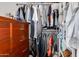 Well-organized walk-in closet with ample shelving and hanging space at 7830 N 17Th Ave, Phoenix, AZ 85021
