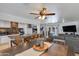 Open concept kitchen and dining area with island and granite countertops at 7830 N 17Th Ave, Phoenix, AZ 85021