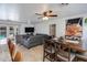 Spacious living room with gray sectional sofa and access to backyard pool at 7830 N 17Th Ave, Phoenix, AZ 85021