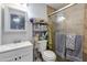 Updated bathroom with shower, vanity, and storage at 7830 N 17Th Ave, Phoenix, AZ 85021