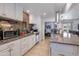 Modern kitchen featuring granite countertops and stainless steel appliances at 7830 N 17Th Ave, Phoenix, AZ 85021