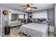 Bedroom with mirrored closet doors and a queen-sized bed at 7830 N 17Th Ave, Phoenix, AZ 85021