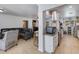 Open kitchen with granite countertops and a breakfast bar at 7830 N 17Th Ave, Phoenix, AZ 85021