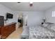 Spacious bedroom with ensuite bathroom and a dresser at 7830 N 17Th Ave, Phoenix, AZ 85021