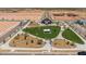 Aerial view of community park with green space and gathering area at 10130 S Bickwell Trl, Apache Junction, AZ 85120