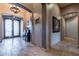 Elegant entryway with tile floors and double doors at 6762 W Hombre Rd, San Tan Valley, AZ 85144