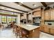 Large kitchen with center island, breakfast bar, and stainless steel appliances at 8212 E Tortuga View Ln, Scottsdale, AZ 85266