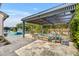 Relaxing patio space with pergola and comfortable seating at 2652 E Pelican Ct, Gilbert, AZ 85297