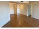 Living room with wood-look floors and access to other rooms at 17404 N 99Th Ave # 317, Sun City, AZ 85373